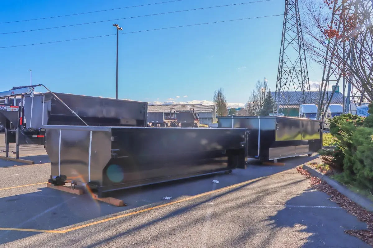 Roll-off dumpster ready for waste disposal at job site for 2 Yard Dumpster Rental in Pocahontas